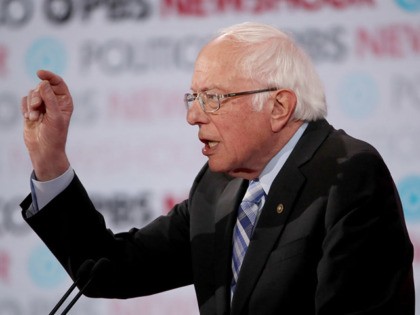 LOS ANGELES, CALIFORNIA - DECEMBER 19: Sen. Bernie Sanders (I-VT) (L) speaks during the Democratic presidential primary debate at Loyola Marymount University on December 19, 2019 in Los Angeles, California. Seven candidates out of the crowded field qualified for the 6th and last Democratic presidential primary debate of 2019 hosted …