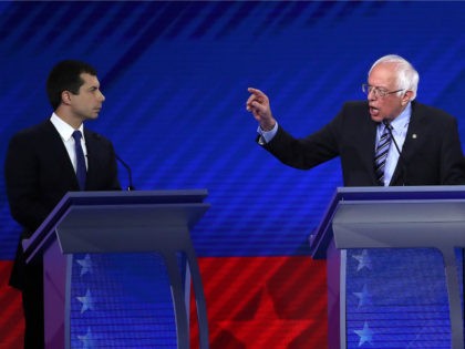 Democratic presidential candidates South Bend, Indiana Mayor Pete Buttigieg and Sen. Bernie Sanders (I-VT) interact during the Democratic Presidential Debate at Texas Southern University's Health and PE Center on September 12, 2019 in Houston, Texas. Ten Democratic presidential hopefuls were chosen from the larger field of candidates to participate in …