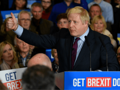 QUEDGELEY, GLOUCESTER, ENGLAND - DECEMBER 09: British Prime Minister and Conservative leader Boris Johnson speaks at a general election campaign rally on December 9, 2019 in Quedgeley, near Gloucester, England. The U.K will go to the polls in a general election on December 12. (Photo by Ben Stansall - WPA …