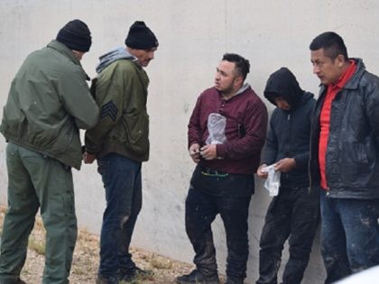 A Rio Grande Sector Border Patrol agent arrests a migrant following his fifth illegal entry into the U.S. (File Photo: Bob Price/Breitbart Texas)