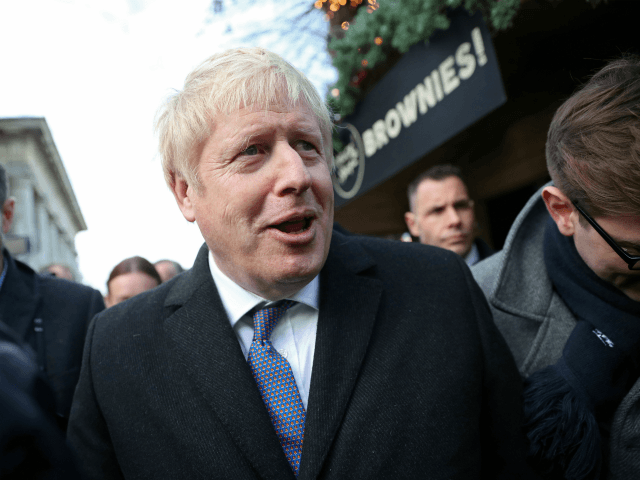 SALISBURY, UNITED KINGDOM - DECEMBER 3: Prime Minister Boris Johnson visits a Christmas market whilst campaigning on December 3, 2019 in Salisbury, England. UK voters are set to go to the polls on December 12 in the country's third general election in less than five years. (Photo by Hannah McKay …