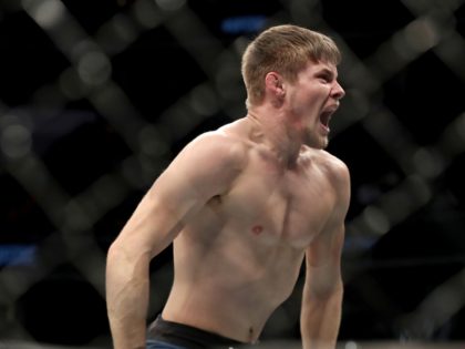 Bryce Mitchell celebrates a win against Matt Sayles after their mixed martial arts bout at UFC Fight Night, Saturday, December 7, 2019, in Washington, D.C. Mitchell won via first-round submission. (AP Photo/Gregory Payan)