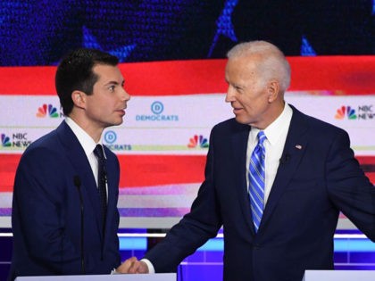 Democratic presidential hopefuls Mayor of South Bend, Indiana Pete Buttigieg (L) and Former US Vice President Joseph R. Biden (R) shake hands after the second Democratic primary debate of the 2020 presidential campaign season hosted by NBC News at the Adrienne Arsht Center for the Performing Arts in Miami, Florida, …