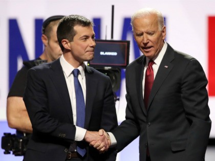 South Bend, Indiana Mayor Pete Buttigieg and former Vice President Joe Biden shake hands after the Democratic Presidential Debate at Otterbein University on October 15, 2019 in Westerville, Ohio. A record 12 presidential hopefuls are participating in the debate hosted by CNN and The New York Times. (Photo by Win …