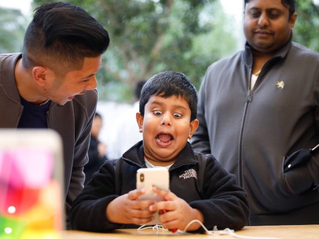 Child surprised by cell phone
