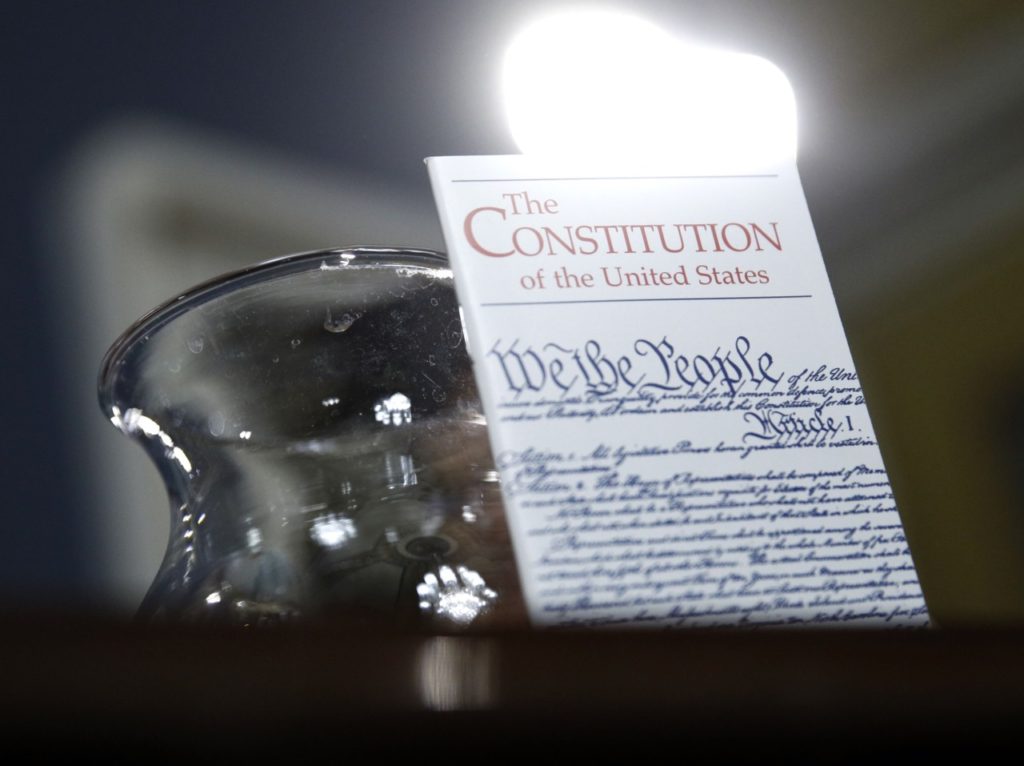 Constitution glass of water (Patrick Semansky - Pool / AFP / Getty)