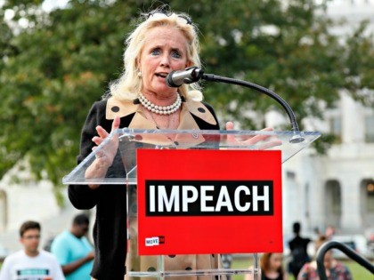Rep. Debbie Dingell (D-MI) speaks at the “Impeachment Now!” rally in support of an imm