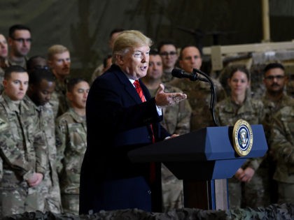 US President Donald Trump speaks to the troops during a surprise Thanksgiving day visit at Bagram Air Field, on November 28, 2019 in Afghanistan. (Photo by Olivier Douliery / AFP) (Photo by OLIVIER DOULIERY/AFP via Getty Images)