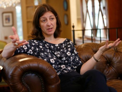 US Congresswoman Elaine Luria, D-2nd Va., gestures during an interview in her home in Norfolk, Va., Thursday, Oct. 3, 2019. Lauria recently joined a group of other Congresswomen to call for the impeachment of President Trump. (AP Photo/Steve Helber)