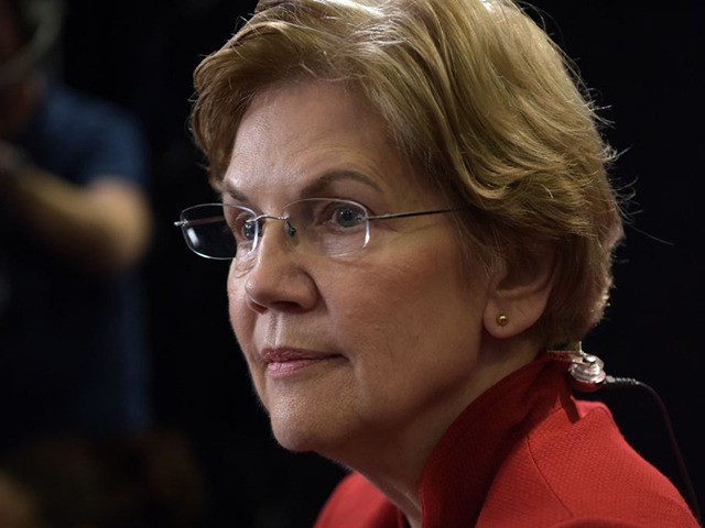 Democratic presidential hopeful Massachusetts Senator Elizabeth Warren speaks to the press in the spin room after the sixth Democratic primary debate of the 2020 presidential campaign season co-hosted by PBS NewsHour & Politico at Loyola Marymount University in Los Angeles, California on December 19, 2019. (Photo by Agustin PAULLIER / …