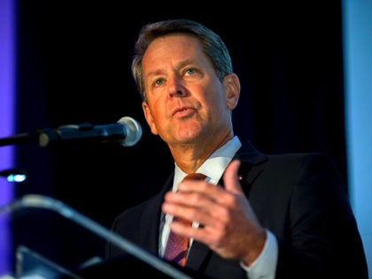 In this image provided by the Georgia Port Authority, Georgia Gov. Brian Kemp speaks durin
