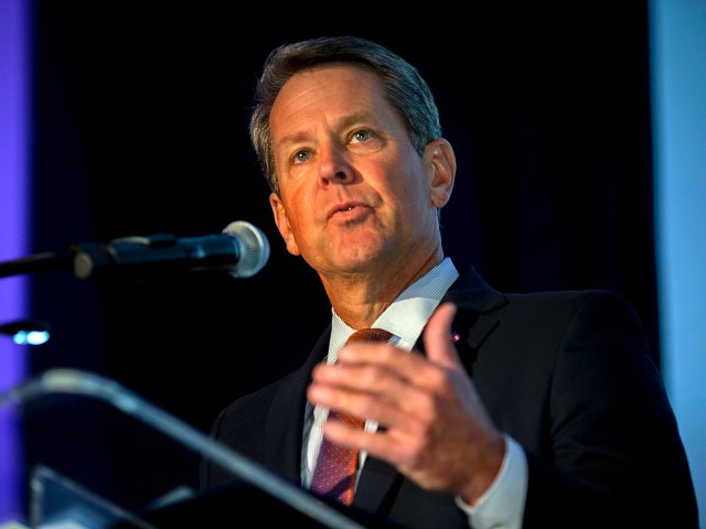 In this image provided by the Georgia Port Authority, Georgia Gov. Brian Kemp speaks during the Georgia Ports Authority's Savannah State of the Port event, Thursday, Sept. 12, 2019, in Savannah, Ga. The GPA plans to double capacity at Garden City Terminal to 11 million twenty-foot equivalent container units per year. In Fiscal Year 2019, port-related industries announced $5 billion in new investment and 12,000 new jobs coming to Georgia. (Stephen Morton/Georgia Port Authority via AP)
