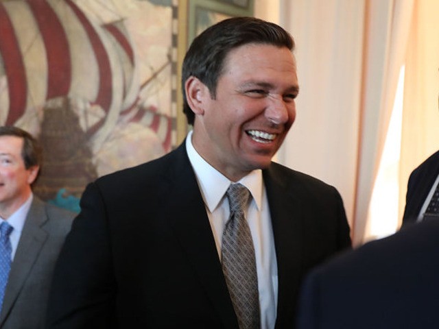 MIAMI, FLORIDA - JANUARY 09: Newly sworn-in Gov. Ron DeSantis greets people as he attends an event at the Freedom Tower where he named Barbara Lagoa (seen on the left) to the Florida Supreme Court on January 09, 2019 in Miami, Florida. Mr. DeSantis was sworn in yesterday as the …