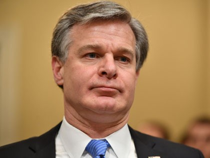 FBI Director Christopher Wray testifies before the House Homeland Security Committee on gl