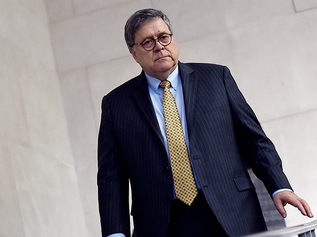 US Attorney General William Barr participates in an awards ceremony for 19 law enforcement officers for their efforts in criminal investigations, field operations and innovations in community policing, in the Great Hall of the Justice Department in Washington, DC on December 3, 2019. (Photo by Olivier Douliery / AFP) (Photo …