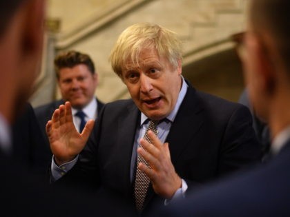 LONDON, ENGLAND - DECEMBER 16: UK Prime Minister Boris Johnson talks with newly-elected Conservative MPs at the Houses of Parliament on December 16, 2019 in London, England. Boris Johnson called a General Election to break the parliamentary deadlock over Brexit and was rewarded with a clear majority of 80. He …