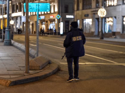 Russian Federal Security Service officer patrols a street next to the FSB security service's office in Moscow on December 19, 2019. - A member of the Russian FSB security service was killed on December 19, in a shootout with a gunman in central Moscow, state media said, quoting the FSB. …