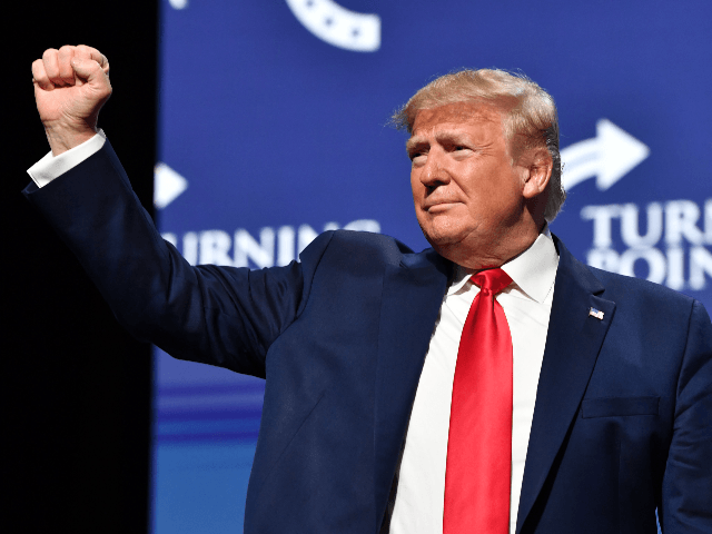 US President Donald Trump gestures during the Turning Point USA Student Action Summit at the Palm Beach County Convention Center in West Palm Beach, Florida on December 21, 2019. (Photo by Nicholas Kamm / AFP) (Photo by NICHOLAS KAMM/AFP via Getty Images)
