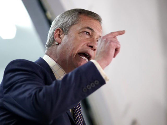 BUCKLEY, WALES - DECEMBER 02: Brexit party leader Nigel Farage addresses supporters at a B