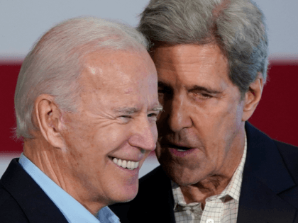 Democratic presidential candidate former U.S. Vice president Joe Biden (L) campaigns with former Democratic presidential candidate John Kerry (R) December 6, 2019 in Cedar Rapids, Iowa. Kerry announced his endorsement of Biden yesterday with the Iowa caucuses less than two months away. (Photo by Win McNamee/Getty Images)