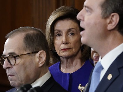 WASHINGTON, DC - DECEMBER 10: Speaker of the House Nancy Pelosi (D-CA) (C) listens as House investigative committee chairs Rep. Adam Schiff (R) (D-CA) and Rep. Jerry Nadler (L) (D-NY) announce the next steps in the House impeachment inquiry at the U.S. Capitol December 10, 2019 in Washington, DC. The …