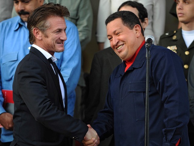 Venezuelan President Hugo Chavez (R) greets US actor Sean Penn after a meeting in Miraflores presidential palace in Caracas on March 5, 2011. Penn, who was visiting Caracas, thanked Chavez for the funding that his government gave to an NGO based in Haiti that assists the victims of the earthquake …