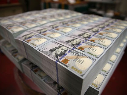 WASHINGTON, DC - MAY 20: Newly redesigned $100 notes lay in stacks at the Bureau of Engrav