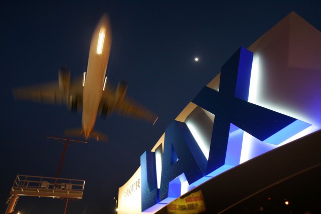 LOS ANGELES, CA - APRIL 15: A jet comes in for landing at Los Angeles International Airport (LAX) on April 15, 2008 in Los Angeles, California. With skyrocketing fuel prices and a weak economy, US airlines are turning to mergers which could ultimately lead to higher fares through reduced flights …