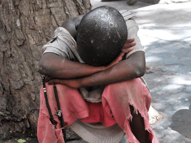 A street child known as 'Talibes' sleeps in a street in Dakar on April 16, 2010. At least 50,000 children attending hundreds of residential Quranic schools, or daaras, in Senegal are subjected to conditions akin to slavery and forced to endure often extreme forms of abuse, neglect, and exploitation by …