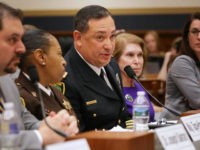 WASHINGTON, DC - FEBRUARY 06: (L-R) Director of Emergency General Surgery at Johns Hopkins Hospital in Baltimore Joseph Sakran, Baltimore City Sheriff's Office Domestic Violence Unit Commander Maj. Sabrina Tapp-Harper, Houston Police Chief Art Acevedo, George Mason University's Antonin Scalia Law School Professor Joyce Lee Malcolm and Giffords Law Center …