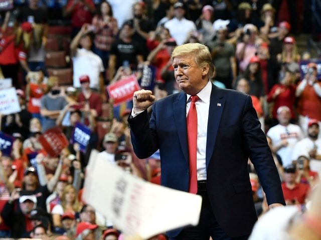 US President Donald Trump pumps his fist during a "Keep America Great" campaign rally at the BB&T Center in Sunrise, Florida on November 26, 2019. (Photo by MANDEL NGAN / AFP) (Photo by MANDEL NGAN/AFP via Getty Images)