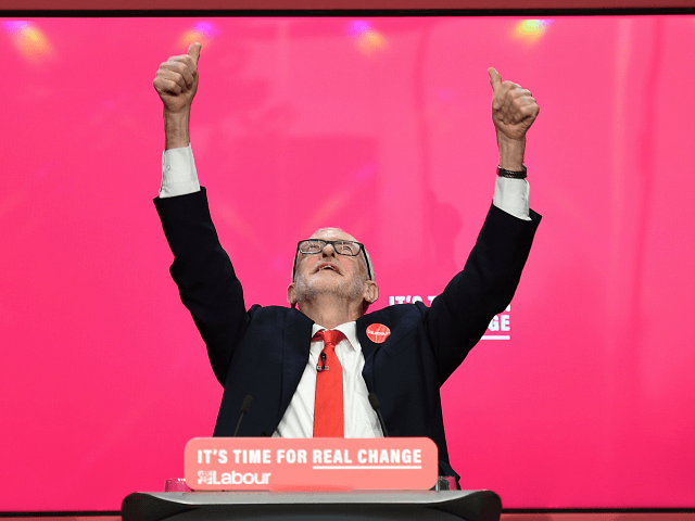 TOPSHOT - Britain's opposition Labour Party leader Jeremy Corbyn reacts during the launch of the Labour party election manifesto in Birmingham, northwest England on November 21, 2019. - Britain will go to the polls on December 12, 2019 to vote in a pre-Christmas general election. (Photo by Oli SCARFF / …