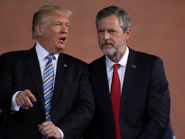 LYNCHBURG, VA - MAY 13: U.S. President Donald Trump (L) and Jerry Falwell (R), President of Liberty University, on stage during a commencement at Liberty University May 13, 2017 in Lynchburg, Virginia. President Trump is the first sitting president to speak at Liberty's commencement since George H.W. Bush spoke in …