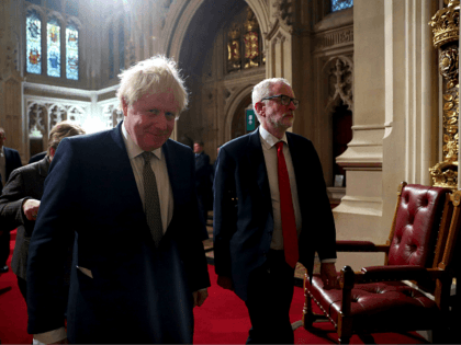 Britain's Prime Minister Boris Johnson (L) and Britain's Labour Party leader Jeremy Corbyn process through the Peers Lobby to listen to the Queen's Speech during the State Opening of Parliament at the Houses of Parliament in London on December 19, 2019. - The State Opening of Parliament is where Queen …
