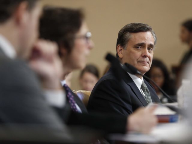 Jonathan Turley and others (Andrew Harnik / Associated Press)
