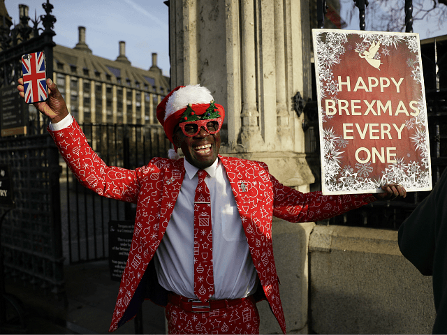 Joseph Afrane, a Brexit supporter protests against Britain being in the European Union, outside the Houses of Parliament in LondonWednesday, Dec. 18, 2019. Prime Minister Boris Johnson's decisive victory in last week's general election provided little comfort to Britain's once world-beating financial services industry, which has been battered by Brexit …