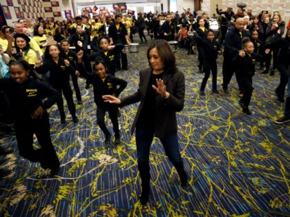 Democratic presidential candidate Sen. Kamala Harris dances as he makes her way to speak to supporters before the Iowa Democratic Party's Liberty and Justice Celebration, Friday, Nov. 1, 2019, in Des Moines, Iowa. (AP Photo/Charlie Neibergall)