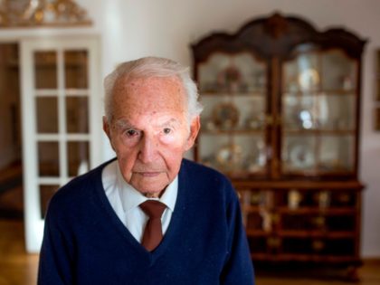 Holocaust survivor Leon Schwarzbaum poses for a picture in his home in Berlin on December