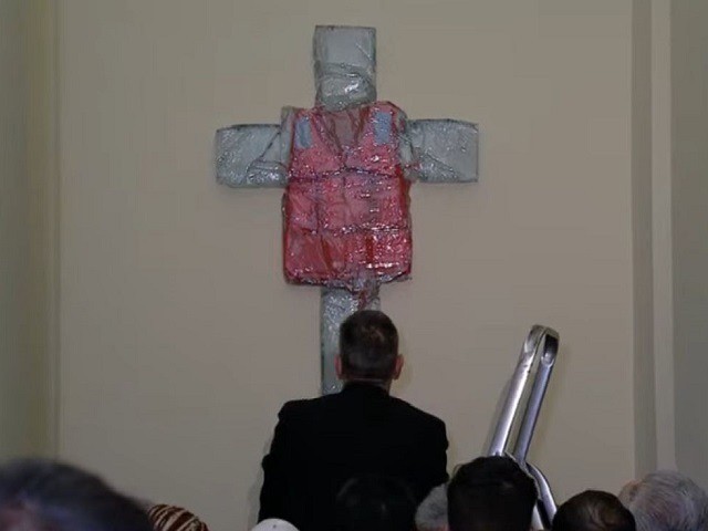 Crucified Migrant Life vest
