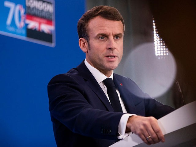 HERTFORD, ENGLAND - DECEMBER 04: French President Emmanuel Macron gives a press conference
