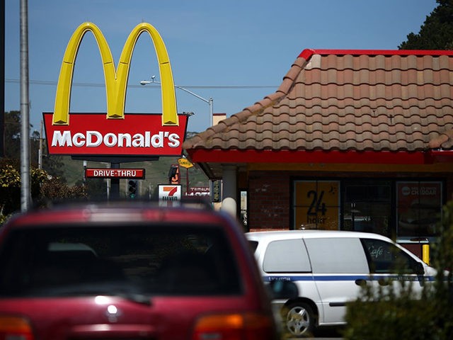 MILL VALLEY, CA - MARCH 12: Customers wait in a drive through line at a McDonald's restaurant on March 12, 2013 in Mill Valley, California. McDonald's has retained its number one ranking in both global and domestic sales and continues to be the largest single restaurant brand in the world …