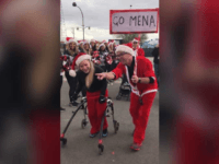 17-year-old Mena Hawkins with cerebral palsy walked across the finish line at the Las Vegas Great Santa Run. SOURCE: Roger Hawkins