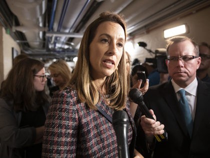 Debt - Rep. Mikie Sherrill, D-N.J., talks to reporters after Speaker of the House Nancy Pelosi, D-Calif., met with the Democratic Caucus and was persuaded to launch a formal impeachment inquiry against President Donald Trump, at the Capitol in Washington, Tuesday, Sept. 24, 2019. Sherrill is one of several freshmen …