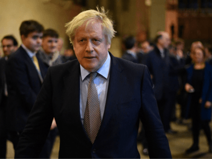 Britain's Prime Minister Boris Johnson greets newly-elected Conservative MPs in the Palace of Westminster, central London on December 16, 2019. - Prime Minister Boris Johnson got down to work Monday following his sweeping election victory, appointing ministers and announcing plans to publish legislation this week to get Britain out of …