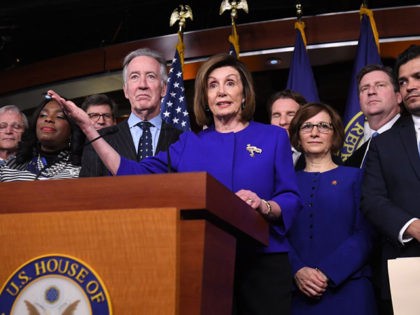 Speaker of the House Nancy Pelosi and House Ways and Means Committee Chairman Richard Neal(L), Democrat of Massachusetts, speaks about the US - Mexico - Canada Agreement, known as the USMCA, on Capitol Hill in Washington, DC, December 10, 2019. - Officials from the US, Canada and Mexico will meet …