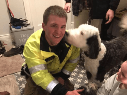On Christmas Eve, a dog Charlie ran away, broke through the ice & got stuck in a marsh. Family tried to rescue him, but broke through the ice. Because they were safe on arrival, firefighters in "mustang suits" (ice rescue gear) helped find & reunite Charlie with his family.
