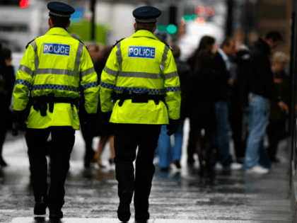 GLASGOW, UNITED KINGDOM - DECEMBER 07: Police officers patrol Buchanan Street in Glasgow,