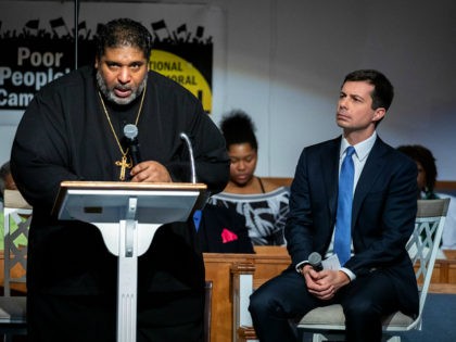 Reverend William Barber introduces South Bend, Indiana mayor and Democratic presidential candidate, Pete Buttigieg, during Sunday morning service at Greenleaf Christian Church in Goldsboro, North Carolina on December 1, 2019. (Photo by Logan Cyrus / AFP) (Photo by LOGAN CYRUS/AFP via Getty Images)
