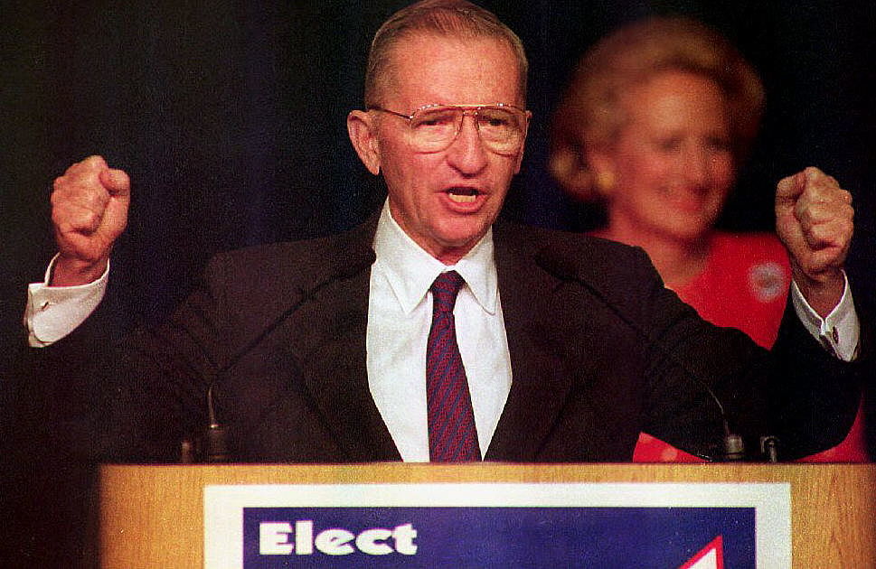 DALLAS, TX - NOVEMBER 3: U.S. independent presidential candidate Ross Perot delivers his concession speech to the crowd gathered 03 November 1992 at his election night headquarters after Democrat Bill Clinton won the presidential election. Perot vowed his efforts and organization would go on,TX. (Photo credit should read PAUL RICHARDS/AFP via Getty Images)