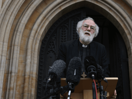 CROYDON, ENGLAND - OCTOBER 17: Former Archbishop of Canterbury Dr Rowan Williams speaks to the media outside Croydon Minster on October 17, 2016 in Croydon, England. Fourteen migrant children from the 'Jungle Camp' in Calais are due to arrive in the UK today to be reunited with relatives. (Photo by …